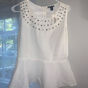 White peplum top